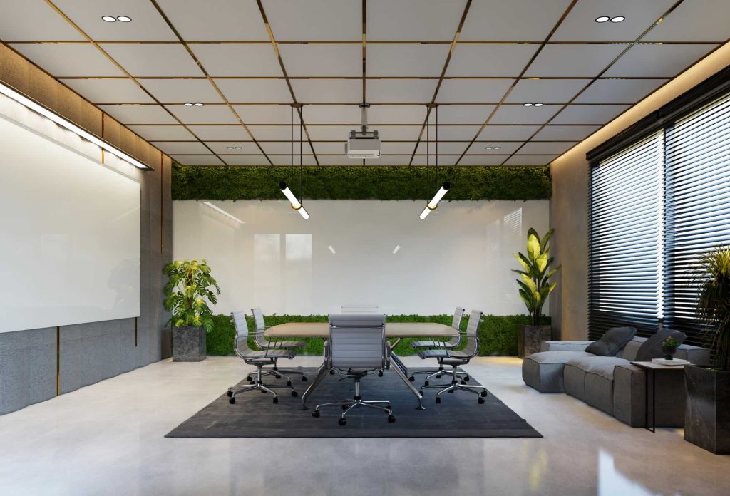 Modern boardroom designed during commercial fitout renovations in Keysborough with greenery feature wall, contemporary lighting and office seating