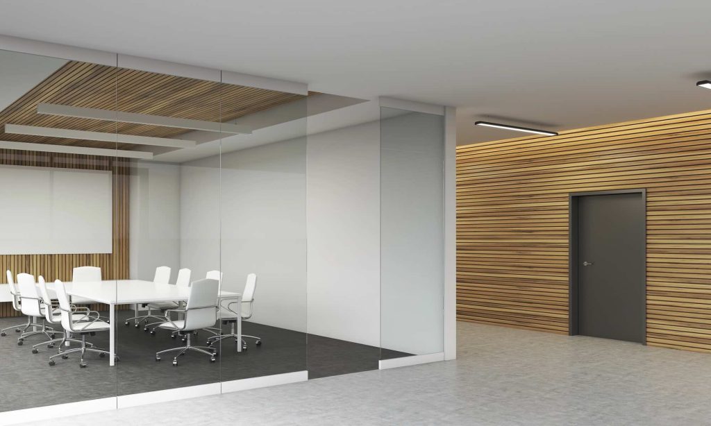 Modern boardroom created during commercial fitout renovations in Mulgrave with timber feature wall, glass partitions and contemporary office seating